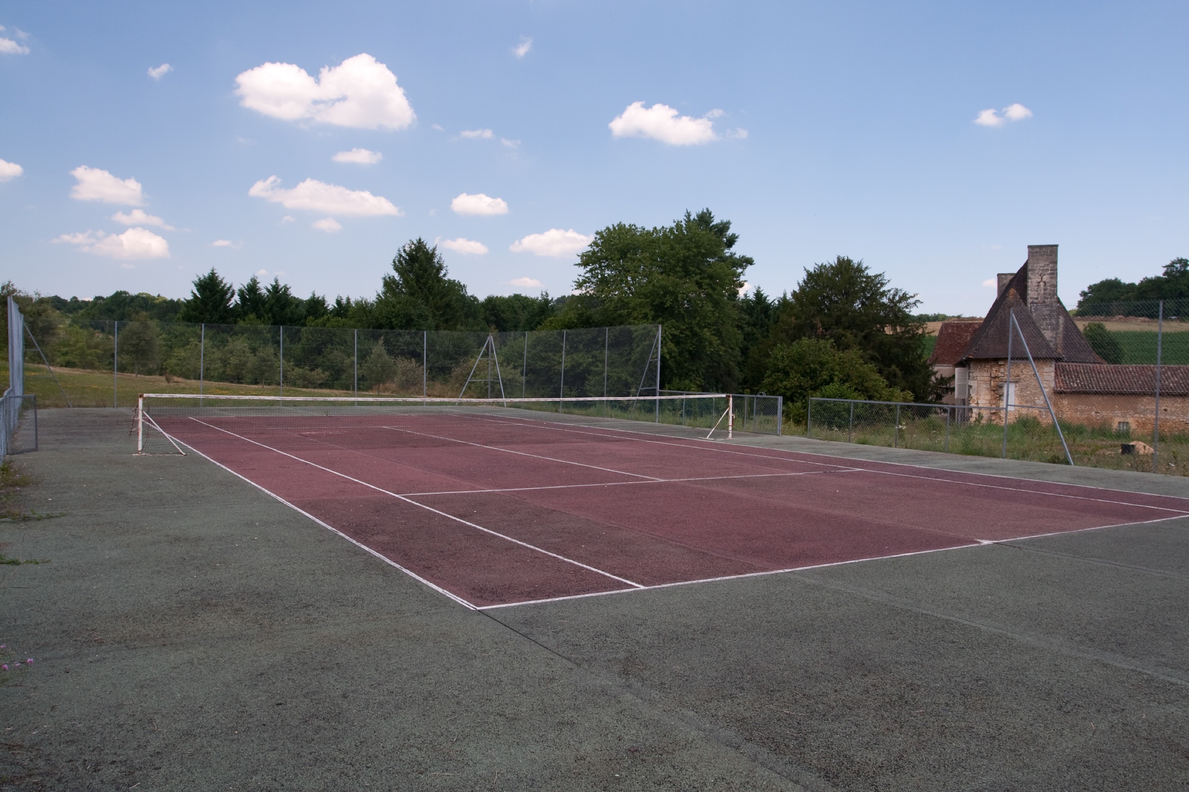 The tennis court is 50 metres from the gite, rackets are available on site.